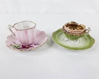 Lot 065   1 Bid(s)
Vintage Hand Painted Tea Cups and Saucers
