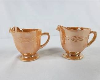 Lot 083   4 Bid(s)
2 Fire-King Peach Lusterware Creamers