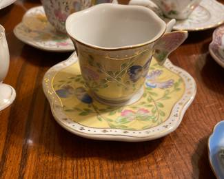 Tea cups with butterfly handles