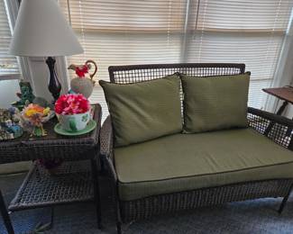 Outdoor resin furniture.   Couch, endtable, coffee table & matching rockers