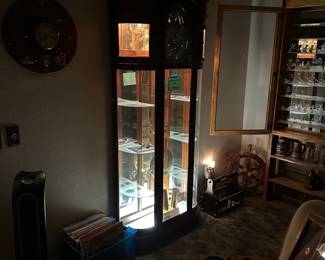 Clock at night. Very nice lighting for displaying all the cat figurines you buy.