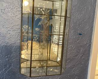 nice selection of glass wall curios