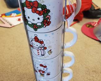 Hello Kitty sanrio christmas stacked ceramic mugs set of 4. Brand new see pics for details