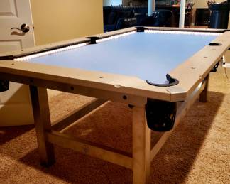 Completely water & weather proof
Amazing night play; the world's only lit pool table surface
Pockets and markers are also lit