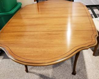 Dining table with chairs (chair shown in other picture). Coordinating hutch available as well.