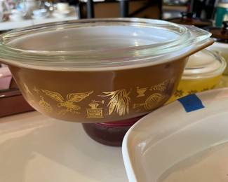 Assortment of Pyrex and Corningware pieces.