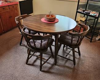 Table,  4 chairs and 2 leaves