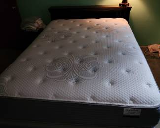 Regular size bed. Serta pillow top and box spring.   Excellent condition.  No stains, rips or tears