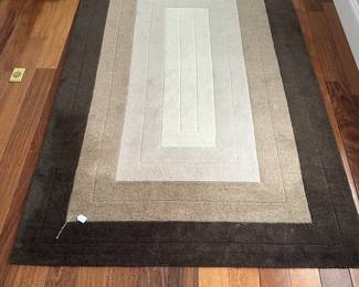 G51 - $100 - Measures 8' x 5'. 100% wool. Horizon rug brand. 