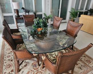 GORGEOUS GLASS TOP DOUBLE PEDASTLE TABLE WITH 6 RATTAN ARM CHAIRS