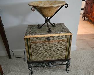 Decorative hinged box on wrought iron stand