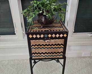 Decorative box on wrought iron legs
