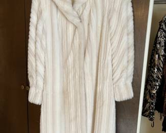 White faux fur coat