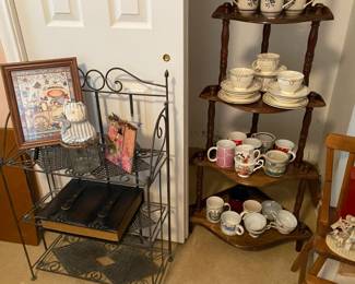 5 tiered corner shelf full of tea and coffee cups, and wrought iron shelf