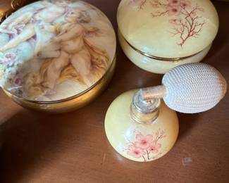 Alabaster Powdrr Puff and perfume atomizer