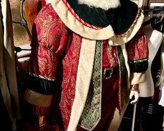 8 Foot Santa from FAO Schwartz. Porcelain like composit face and body. Perfect condition! LOCATED OFFSITE