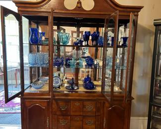 Showcase for sale items inside for sale blue cobalt ,blue crystal, blue willow, blown glass ect.