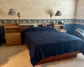 Queen size bed with wood bedframe - headboard has storage and platform has drawers underneath