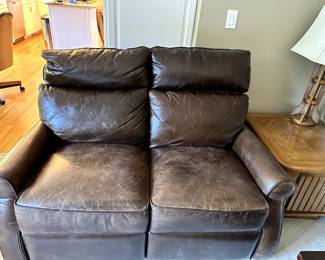 Leather loveseat with manual recliners