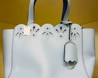 $75 Kate Spade light blue purse 
