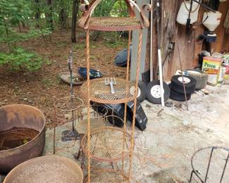 RO120 - $125. Tall 4 shelf iron plant stand 