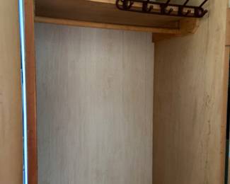 Inside of large blue armoire 