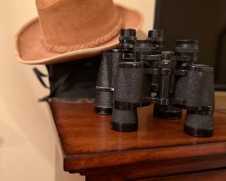 Suede leather cowboy hat 
Binoculars 