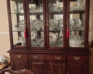 Lighted cherry China hutch 