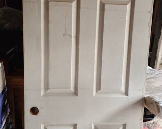 3 unfinished doors. Needs paint