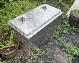 Aluminum pick-up truck trunk under bed tool box.