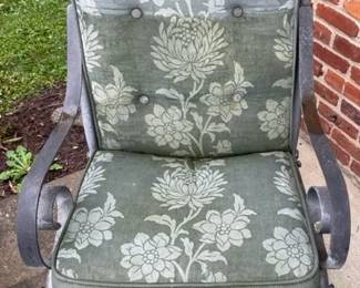 Patio chair with cushion.