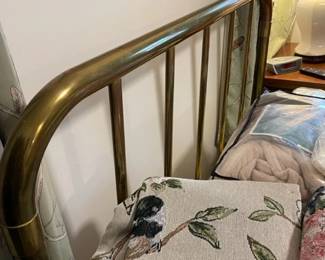 Brass bed.