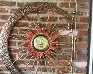 Gold metal rustic outdoor wall decor.