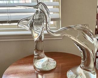 These stunning glass sculptures are hand blown in Italy but the Zanetti Murano company. They are a set 