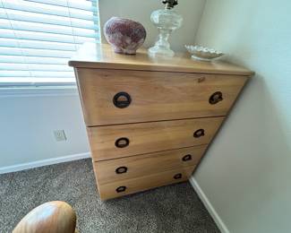 This 4 drawer dresser has unique handles and has the perfect amount of drawer space. 