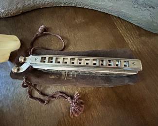 An original Hohner Chordomonica II harmonica in its original bag. This thing is so cool and we can’t wait for the perfect buyer to scoop this up 