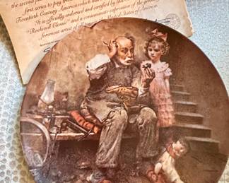 An original numbered Norman Rockwell plate “The Cobbler” By Knowles 