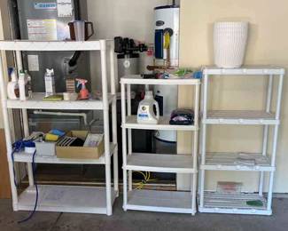 Three Plastic Shelves And Contents