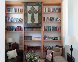 Books in Library, Leather sofa (worn, needs sewing: $50) sofa table, and Floral arrangement all  for sale