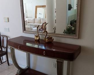 Lovely mahogany entry table matching mirror,  silver accents.
