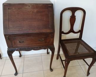 Small antique desk from England and closed position.
Chair being sold separately.