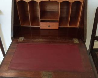 Small antique desk in open position.