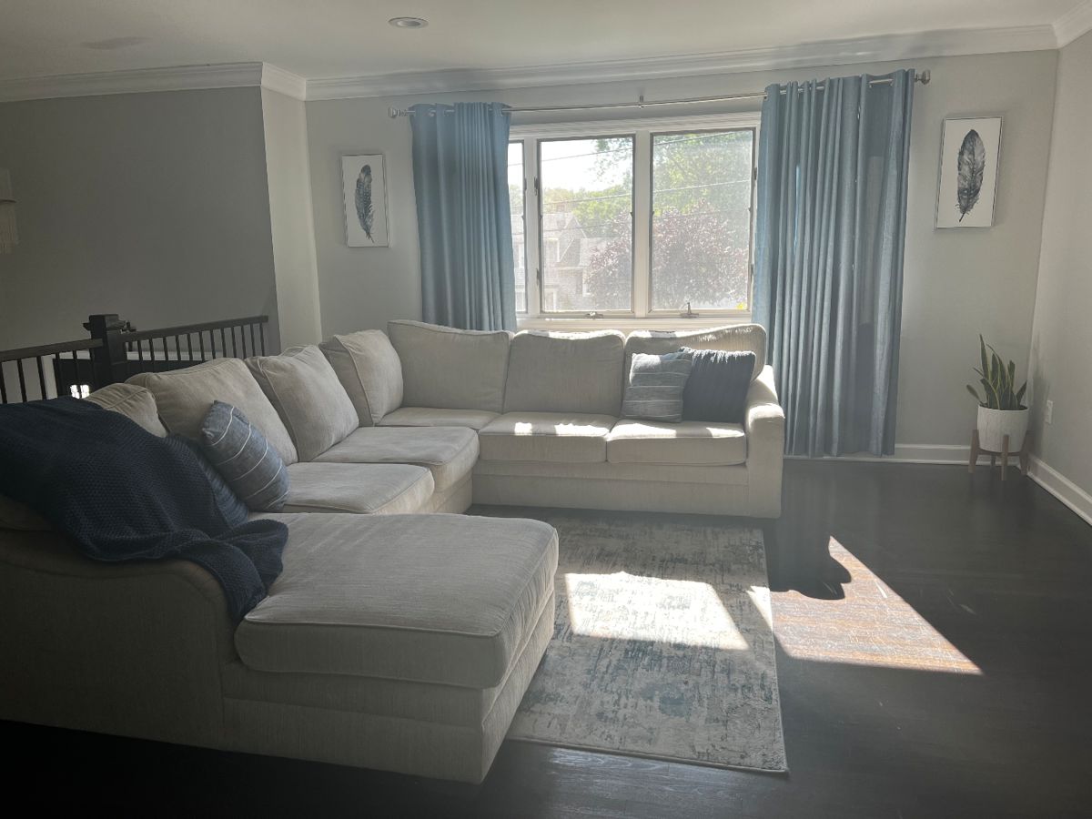 Available for sale: 
Sofa, pillows, rug, wall decor and curtains. 