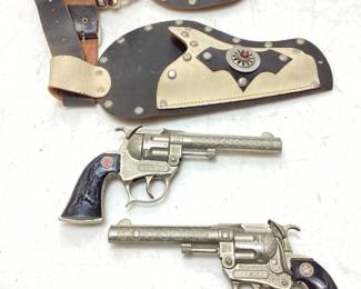 PAIR OF VTG. CAP GUNS w THE HOLSTERS