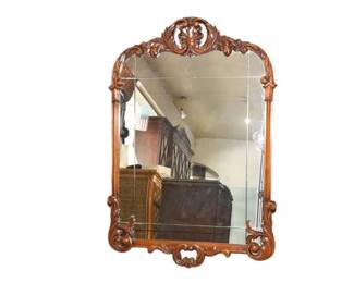 2. Carved Wood Wall Mirror