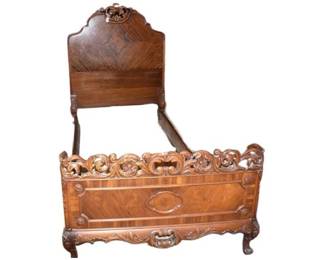 7. Vintage Twin Bed With Carved Accents