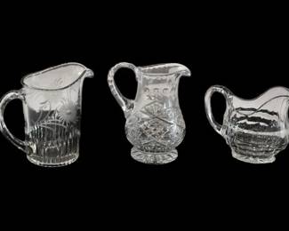 40. Three 3 Glass Pitchers