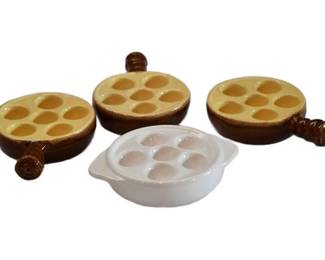 48. Four 4 6Hole Escargot Plates