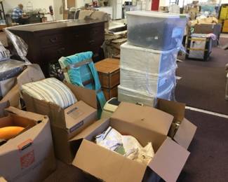 Boxes full of home goods 
