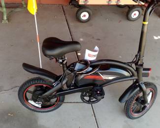 Brand new cost 350.00 never used $250.00 bike folds up goes 20 miles a hour